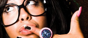 adorable girl with glasses sporting one of a kind cocktail ring