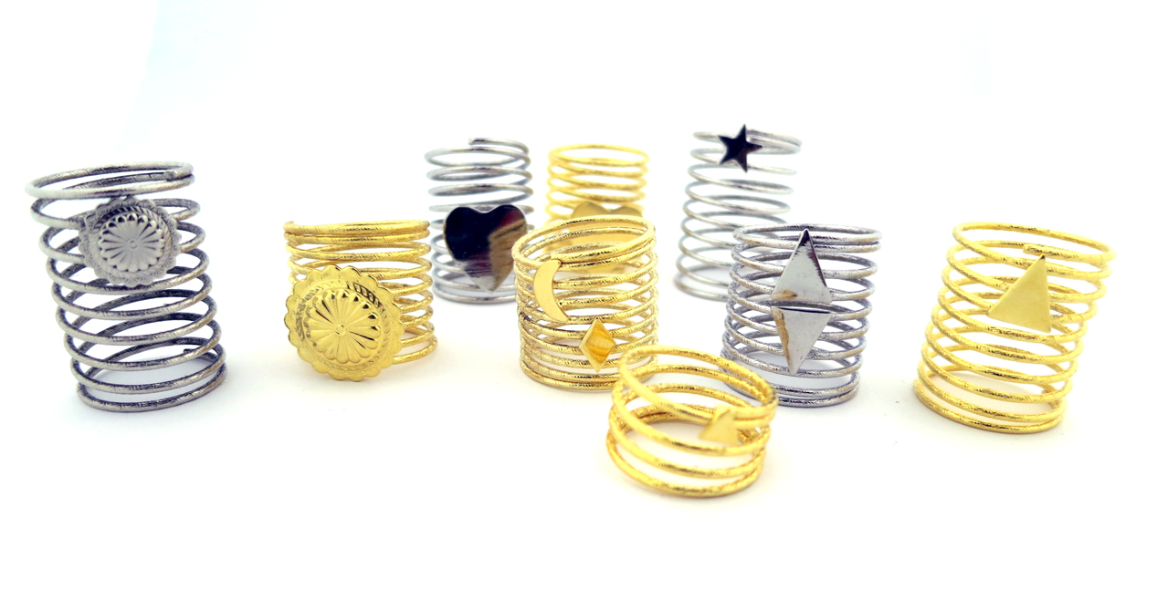 coil rings with assorted adornments 